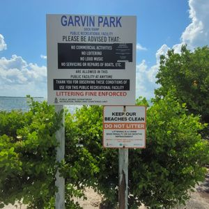 A sign at Garvin Park with rules and regulations for using the public recreational facility.