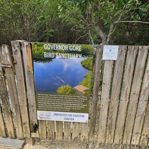 Sign for the Governor Gore Bird Sanctuary, detailing the protected area and its significance.